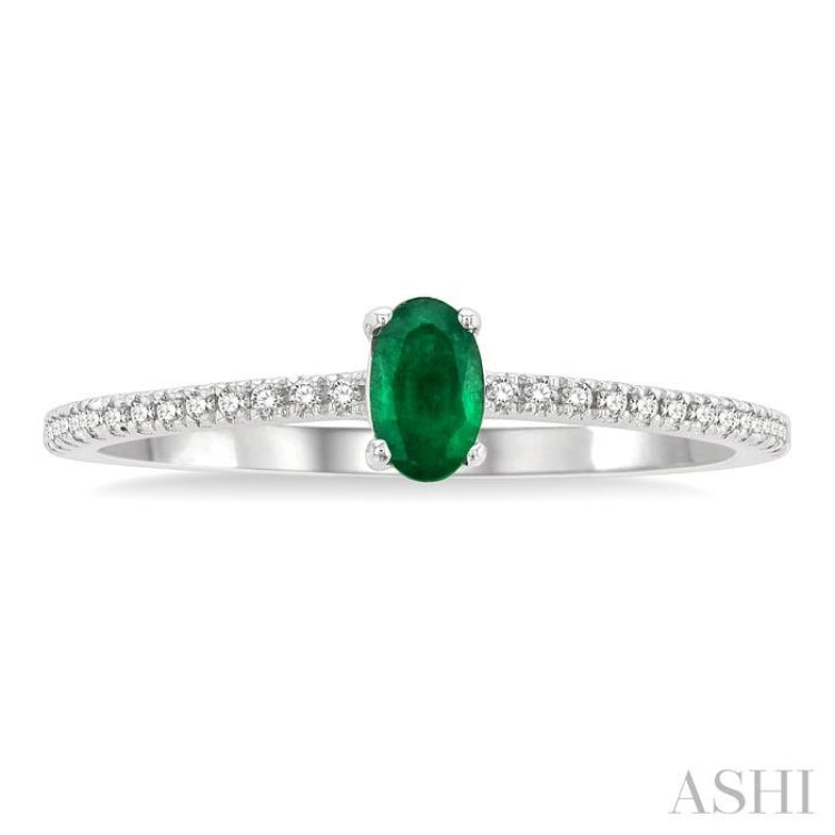5x3 MM Oval Cut Emerald and 1/10 Ctw Petite Round Cut Diamond Precious Fashion Ring in 10K White Gold