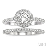 7/8 Ctw Round Cut Diamond Wedding Set With 3/4 Ctw Round Cut Engagement Ring and 1/6 Ctw Wedding Band in 14K White Gold