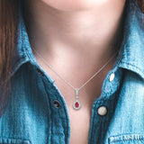 6x4 MM Pear Shape Ruby and 1/6 ctw Round Cut Diamond Pendant in 14K White Gold with Chain