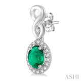 5x3 MM Oval Cut Emerald and 1/6 ctw Round Cut Diamond Earrings in 10K White Gold