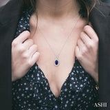 6x4 MM Oval Cut Sapphire and 1/10 ctw Round Cut Diamond Pendant in 10K White Gold with Chain