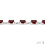 7x7 MM Cushion Shape Garnet and 1/20 ctw Round Cut Diamond Fashion Bracelet in Sterling Silver
