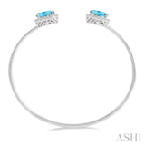 1/10 ctw Oval Shape 9x7 MM Blue Topaz & Round Cut Diamond Bangle in Sterling Silver