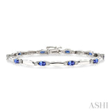 1/10 Ctw Bar and Oval Mount Round Cut Diamond & 5x3MM Oval Cut Tanzanite Precious Bracelet in 10K White Gold