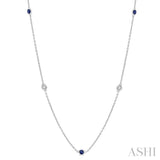 1.75 MM Sapphire and 1/6 ctw Round Cut Diamond Precious Station Necklace in 14K White Gold