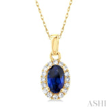 1/20 ctw Round Cut Diamond and 5X3MM Oval Shape Sapphire Halo Precious Pendant with Chain in 10K Yellow Gold