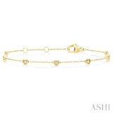 1/10 Ctw Petite Heart Round Cut Diamond Station Bracelet in 10K Yellow Gold